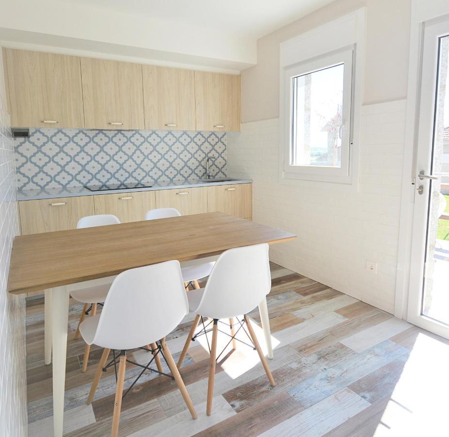 Galihost - Apartamentos Mamuela Ribadumia Bagian luar foto