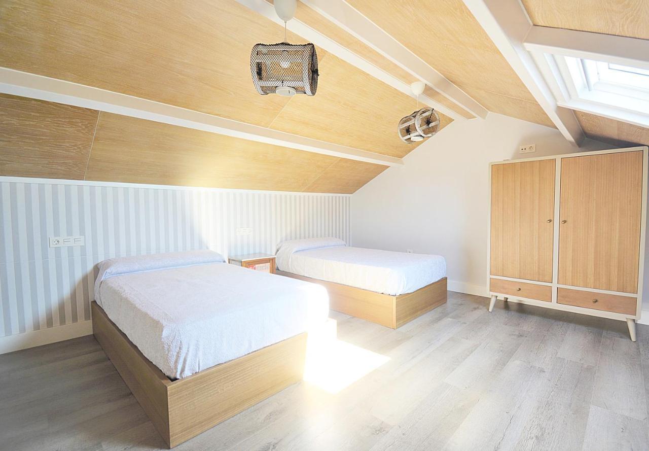 Galihost - Apartamentos Mamuela Ribadumia Bagian luar foto